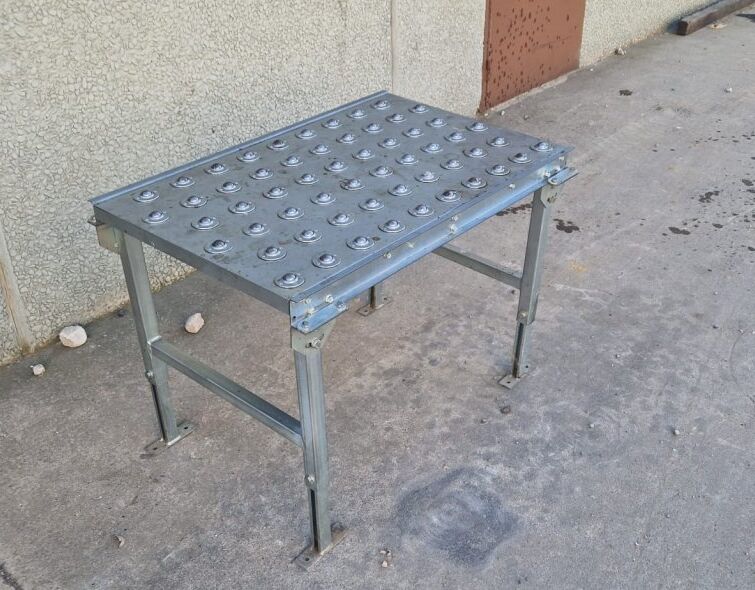 - PACKAGE TABLE WITH ROLLERS
